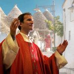 polemica sul vestito del sacerdote